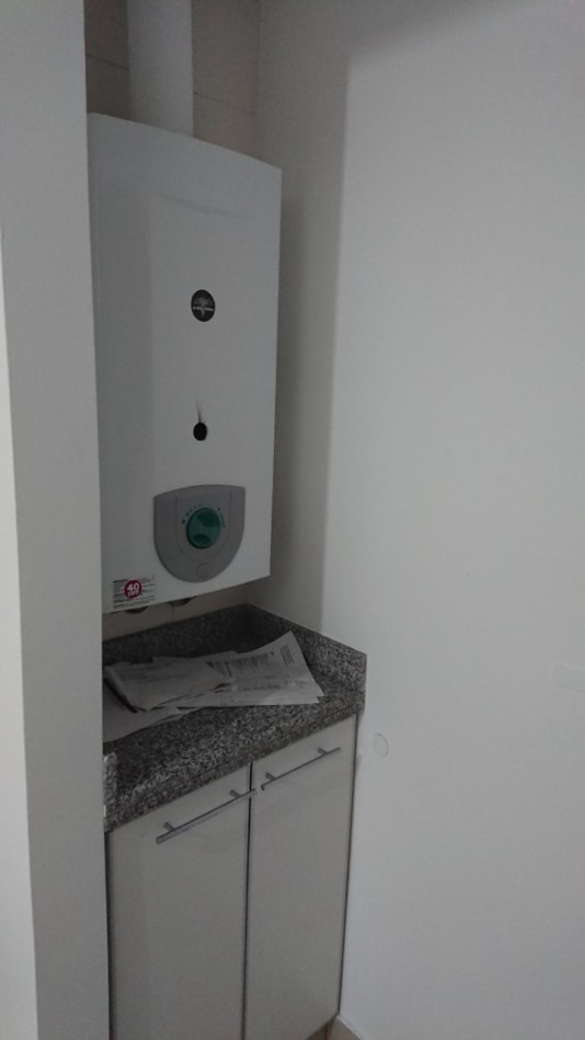 SEMIPISO EXTERNO DE 1 DORMITORIO CON COCHERA